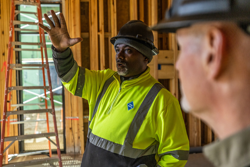 JPI team member on construction site